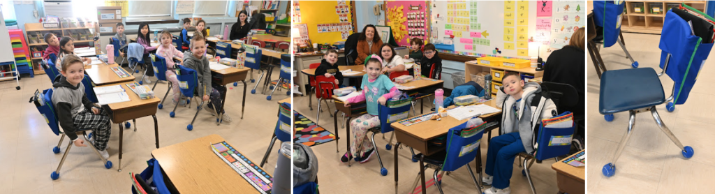 students sitting at desks smiling